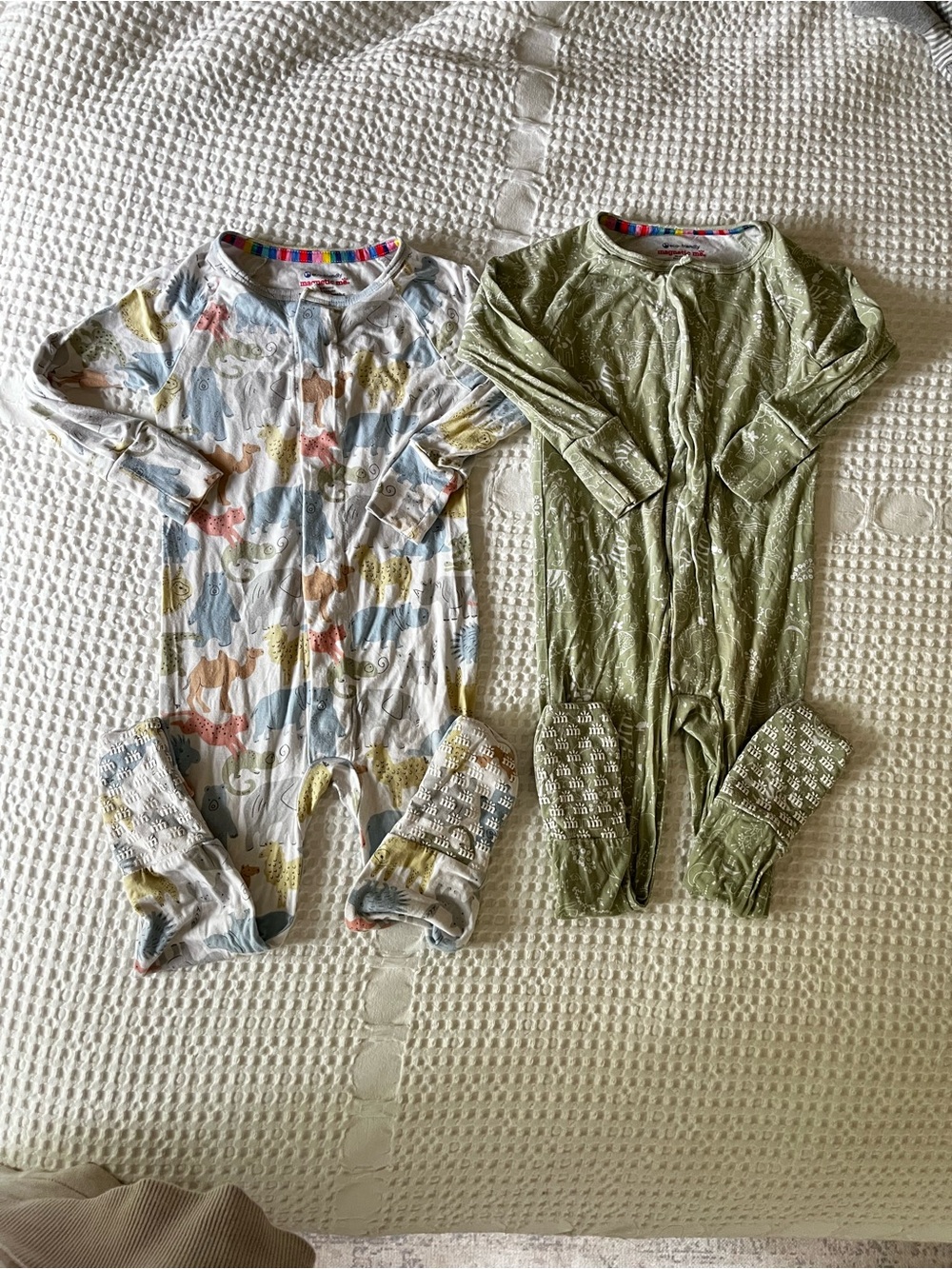 Pair of Magnetic Me Kids Sleepers with fold over feet animal print